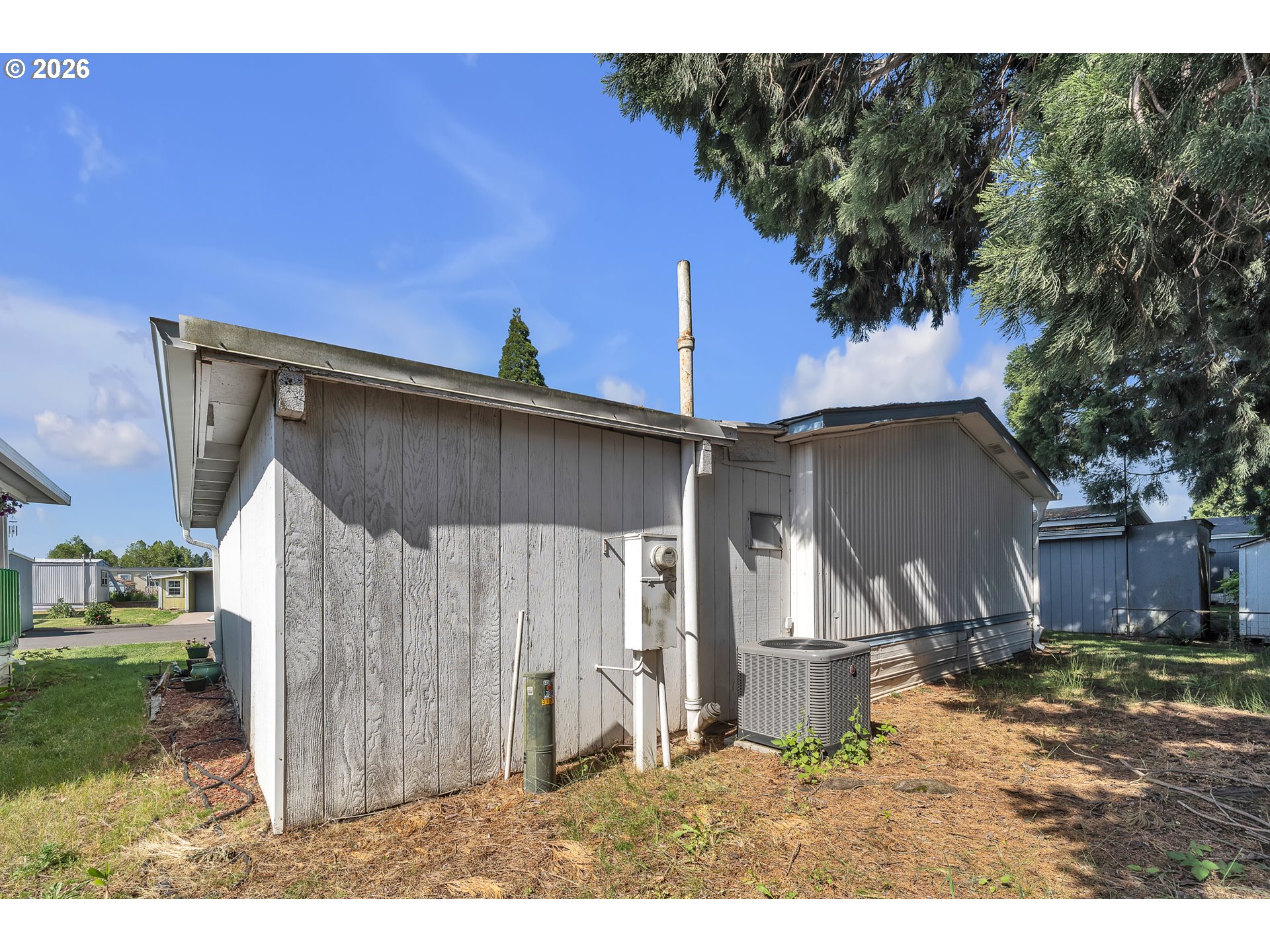 3137 Rainbow Loop Hubbard, OR 97032 - Photo 10 of 27 a view of a back yard of the house