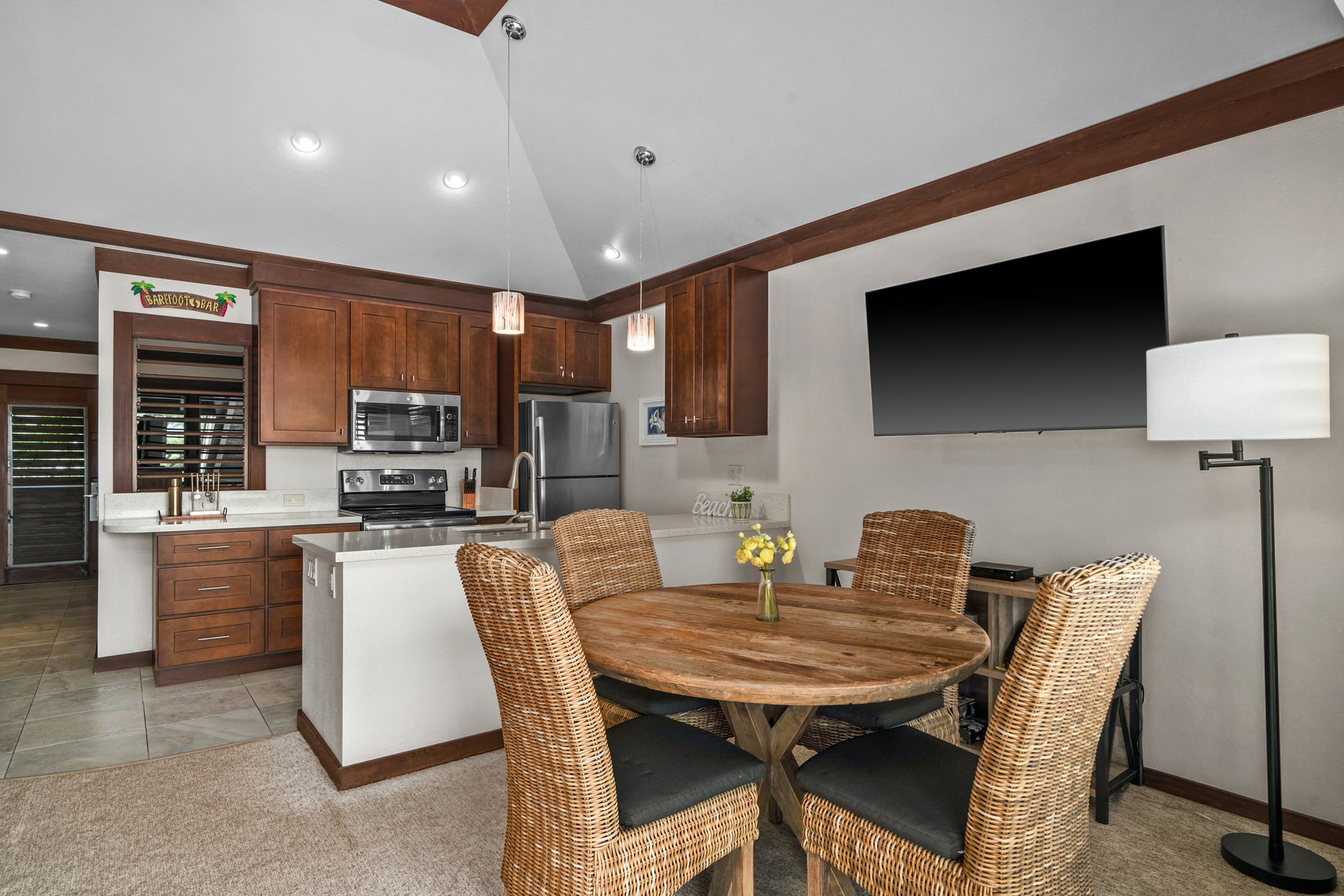 2253 Poipu Road, Unit 99 Koloa, HI 96756 - Photo 11 of 30 a view of a dining room with furniture