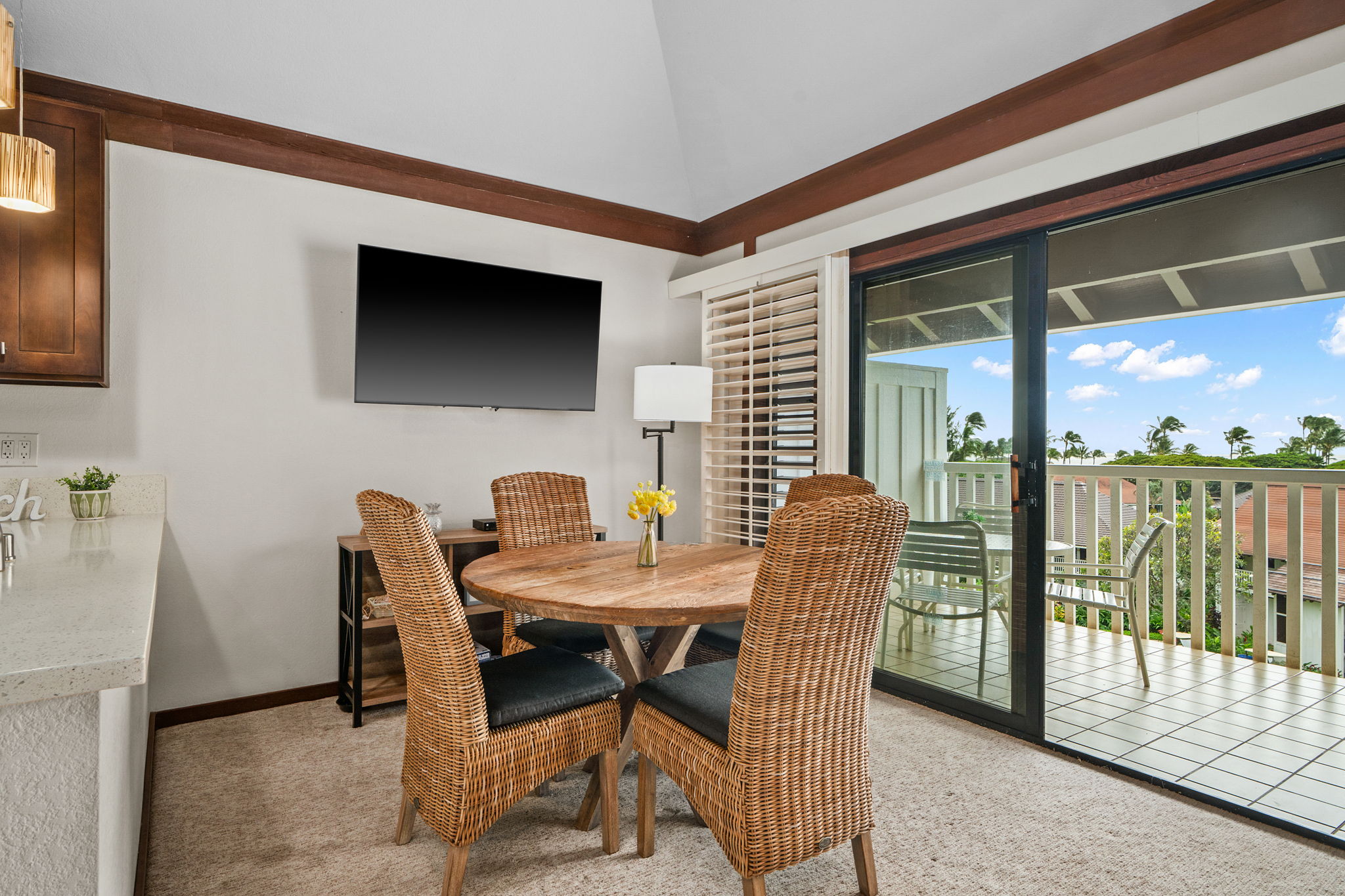 2253 Poipu Road, Unit 99 Koloa, HI 96756 - Photo 14 of 30 a dining room with furniture and window
