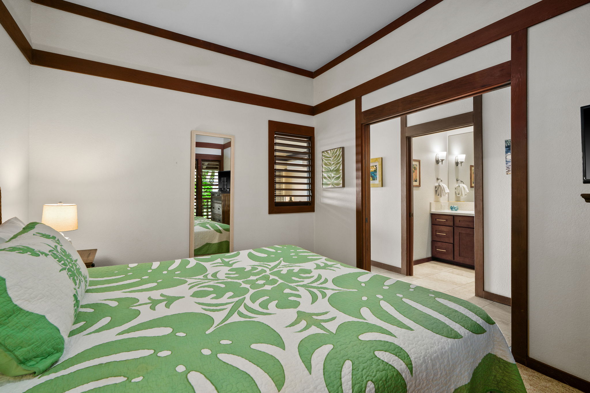 2253 Poipu Road, Unit 99 Koloa, HI 96756 - Photo 22 of 30 a bedroom with a bed and a window