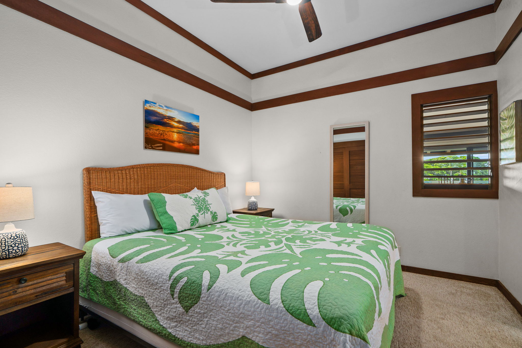 2253 Poipu Road, Unit 99 Koloa, HI 96756 - Photo 23 of 30 a bedroom with a bed and a window