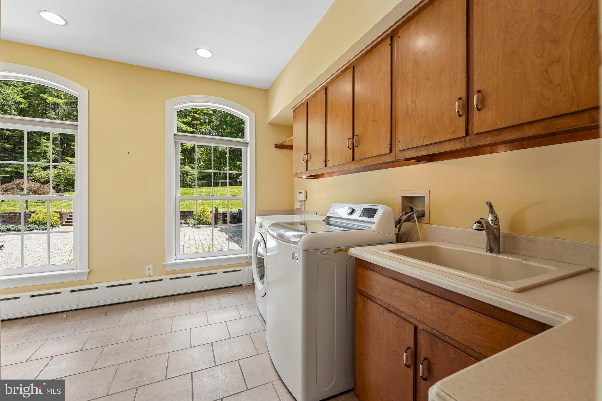 15 Old Covered Bridge Road Newtown Square, PA 19073 - Photo 35 of 71 Large laundry room with utility closet