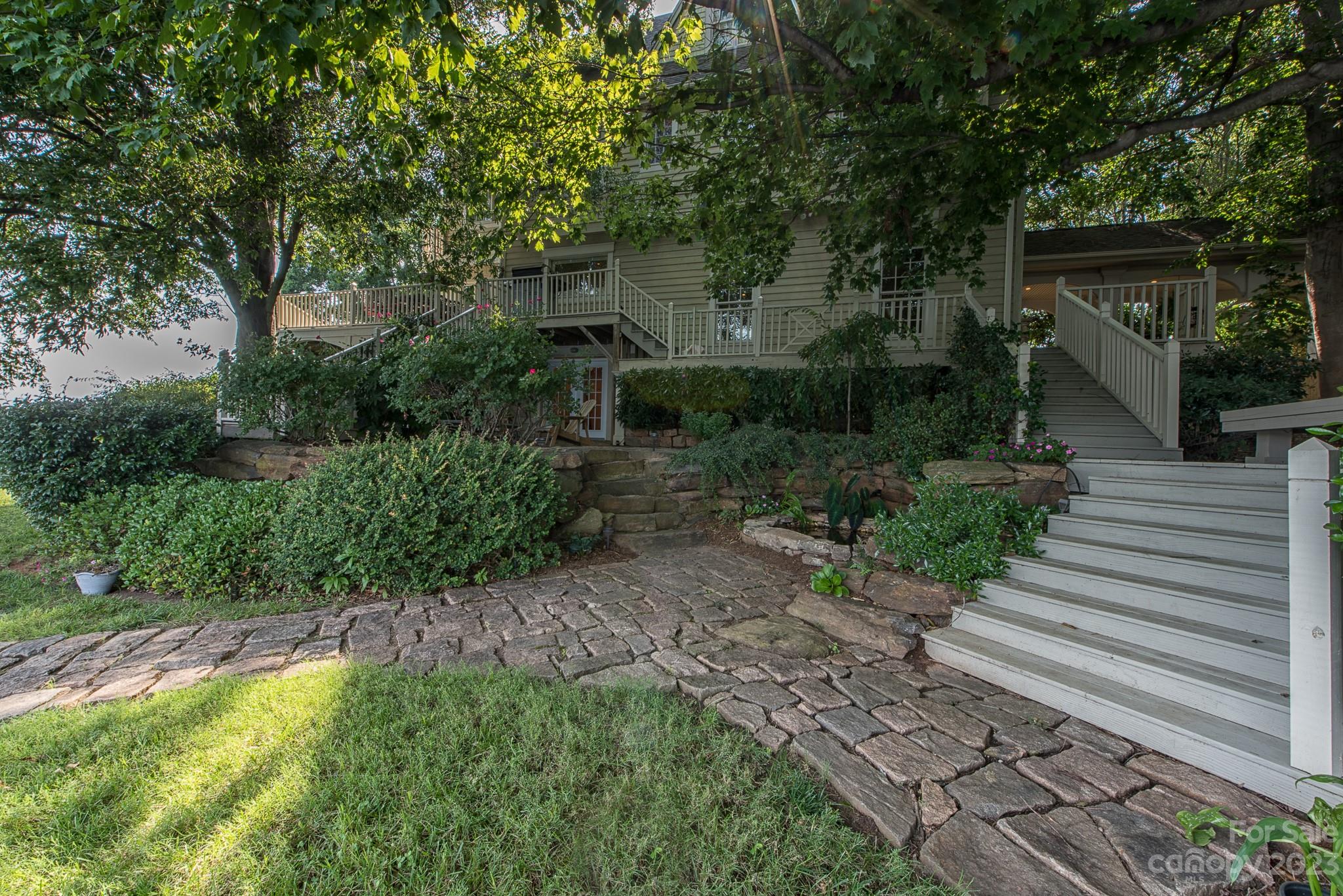 135 Winston Way Troutman, NC 28166 - Photo 11 of 48 a view of a garden with pathway