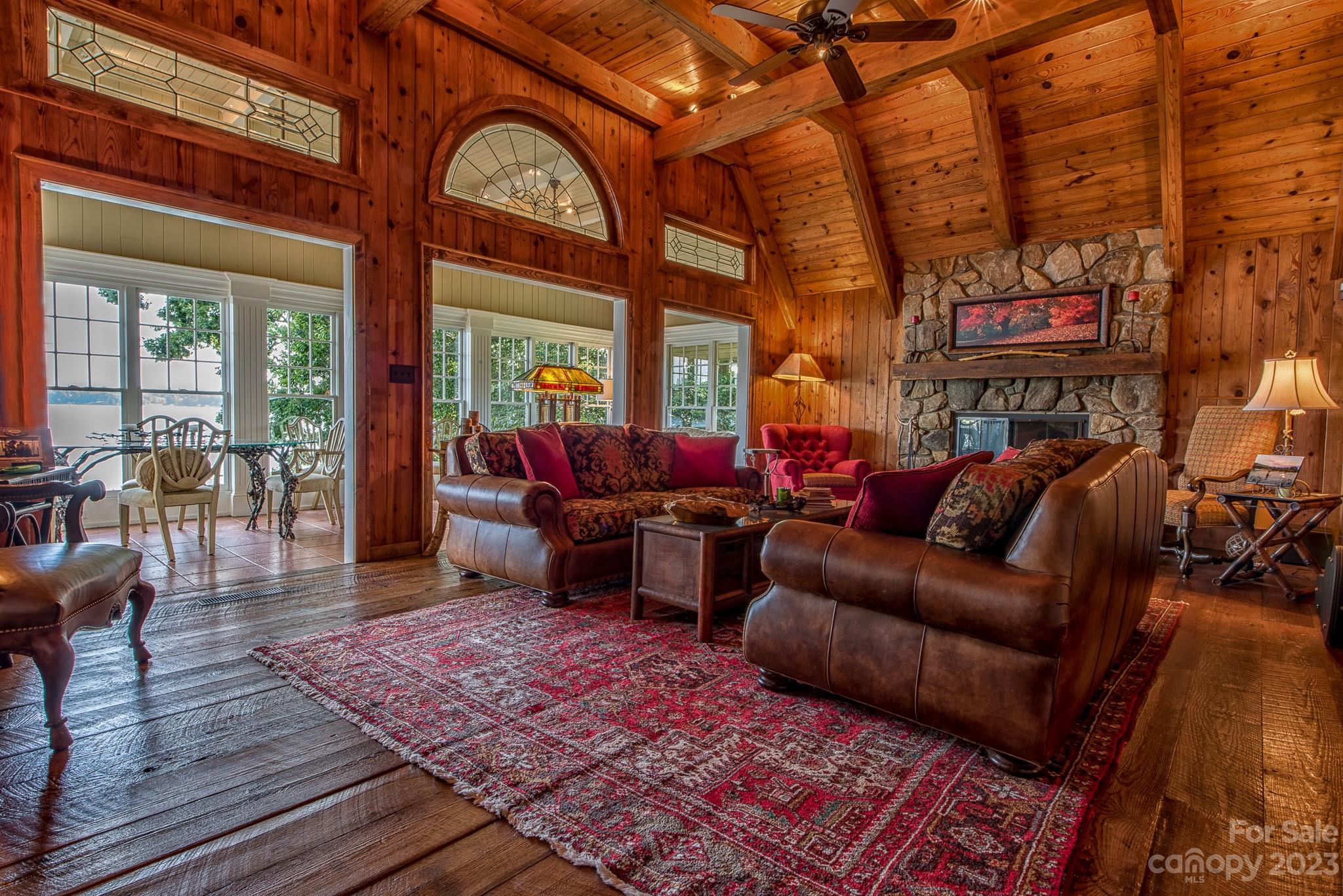 135 Winston Way Troutman, NC 28166 - Photo 19 of 48 a living room with furniture a rug and a large window