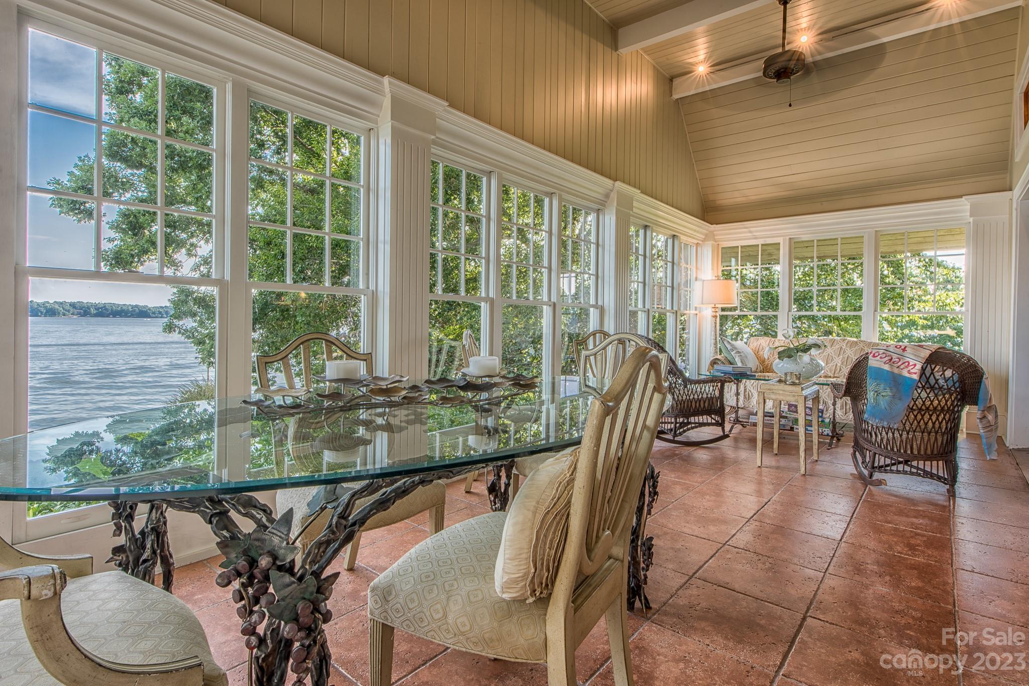 135 Winston Way Troutman, NC 28166 - Photo 20 of 48 a dining room with furniture a chandelier and wooden floor
