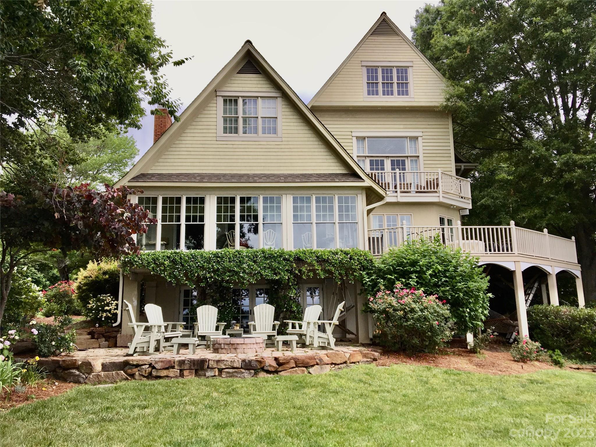 135 Winston Way Troutman, NC 28166 - Photo 2 of 48 a front view of house with yard and outdoor seating
