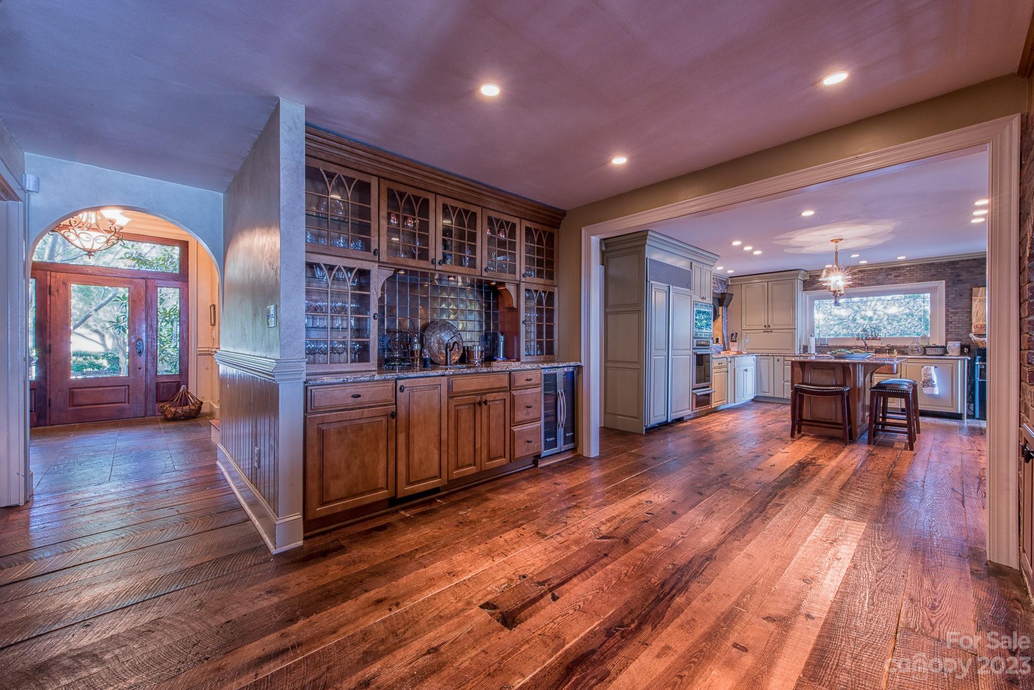 135 Winston Way Troutman, NC 28166 - Photo 23 of 48 a living room with furniture and wooden floors
