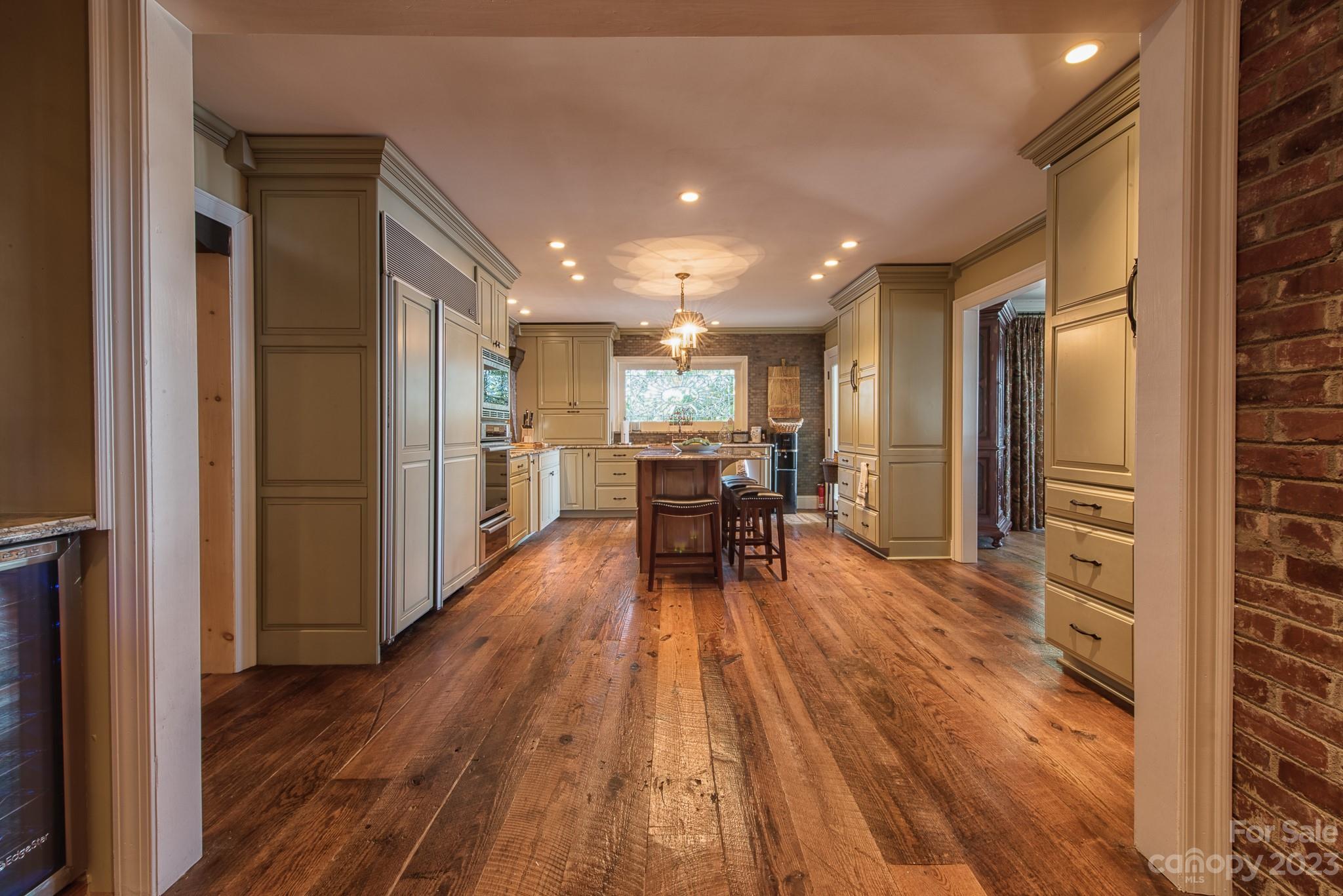 135 Winston Way Troutman, NC 28166 - Photo 24 of 48 a view of a kitchen with a table and chairs