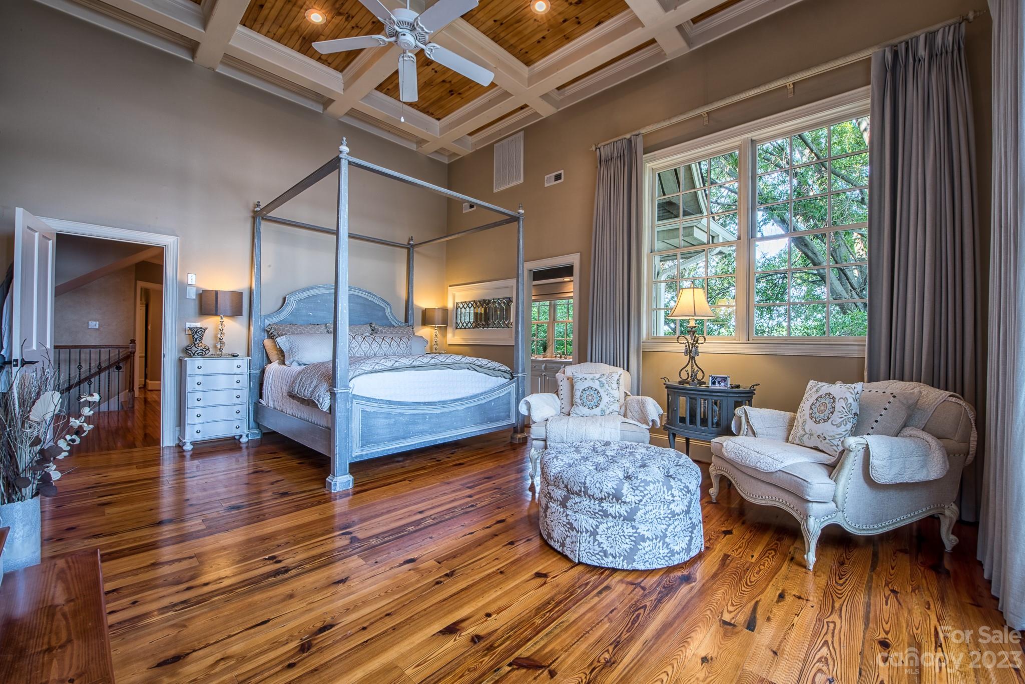 135 Winston Way Troutman, NC 28166 - Photo 27 of 48 a living room with furniture and a large window