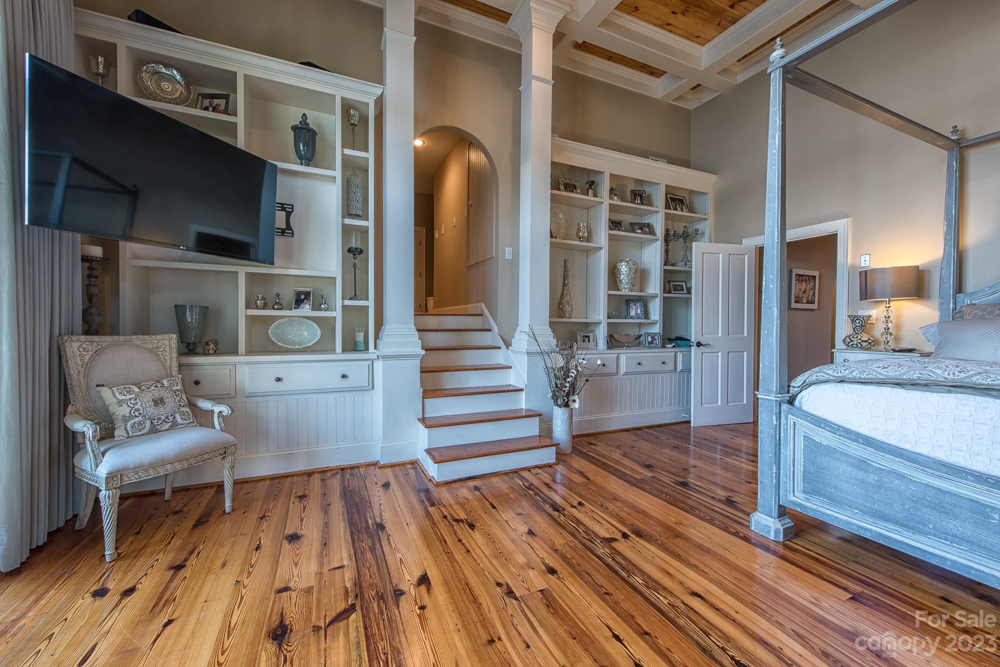 135 Winston Way Troutman, NC 28166 - Photo 28 of 48 a living room with furniture and a wooden floor