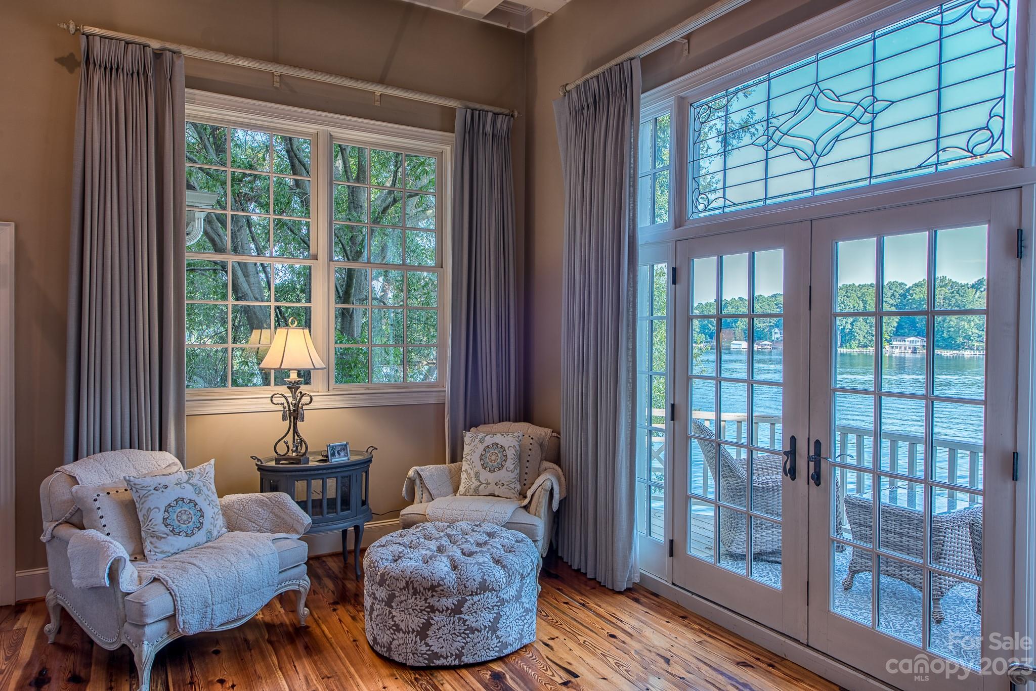 135 Winston Way Troutman, NC 28166 - Photo 29 of 48 a living room with furniture and a large window