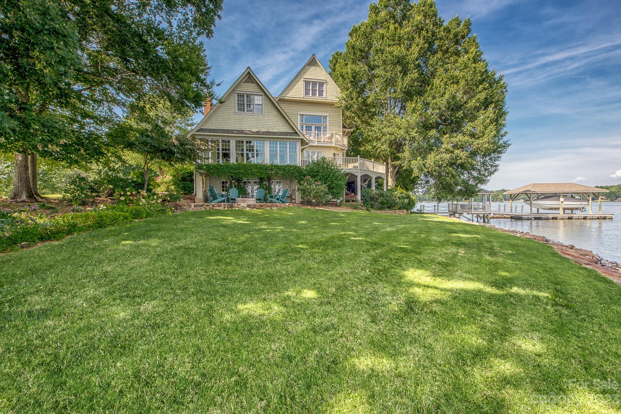 135 Winston Way Troutman, NC 28166 - Photo 3 of 48 a front view of a house with yard and green space