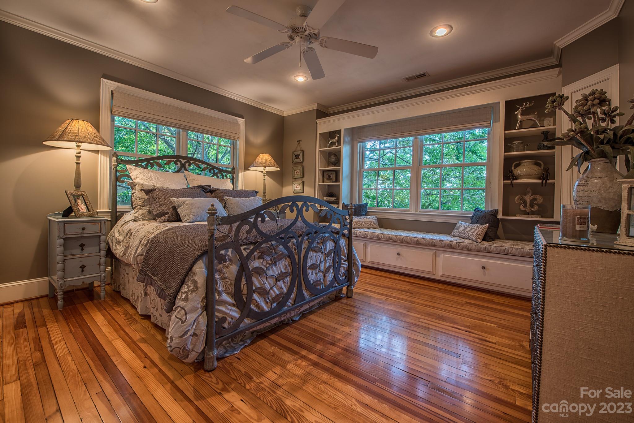 135 Winston Way Troutman, NC 28166 - Photo 36 of 48 a spacious bedroom with a bed and a large window