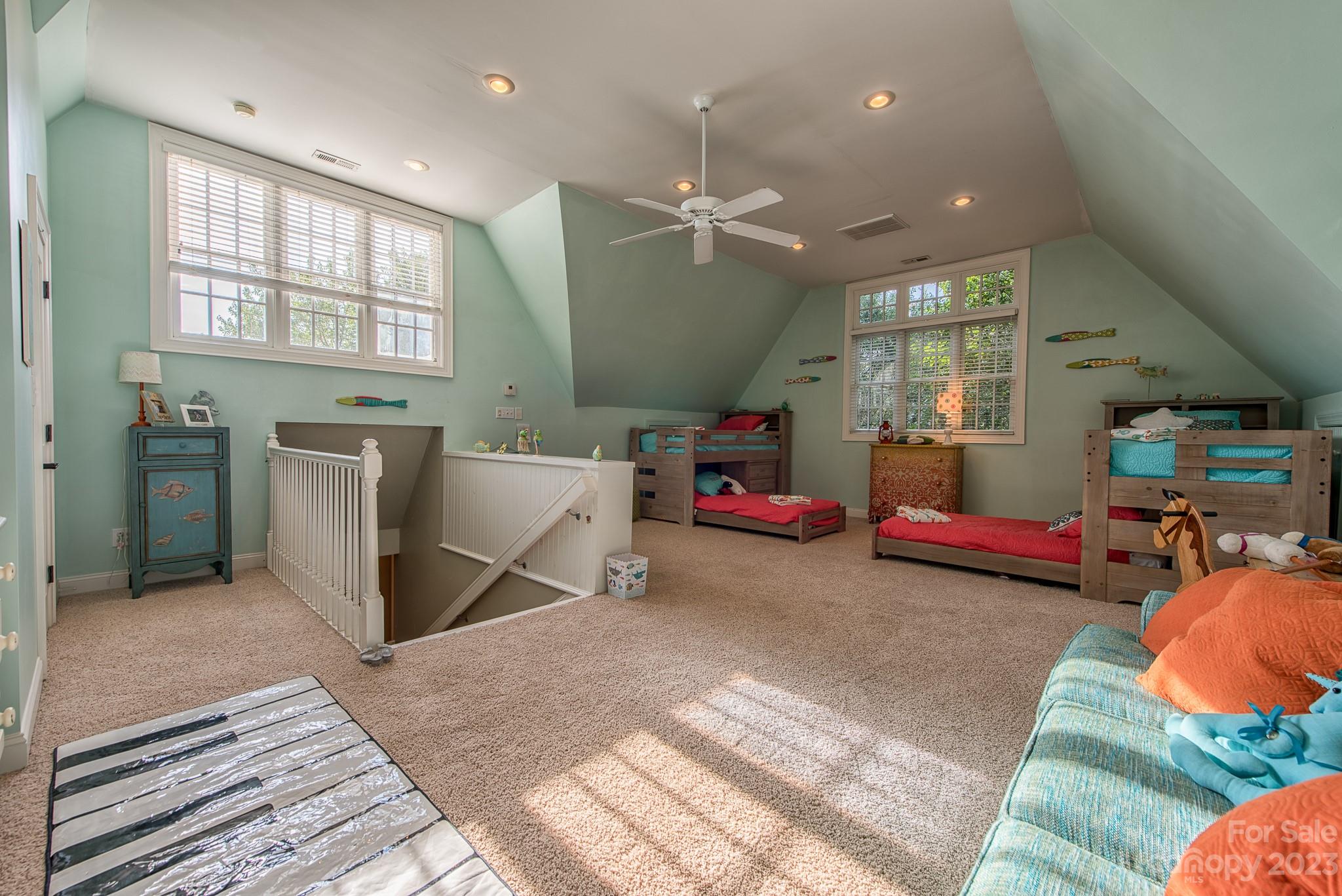 135 Winston Way Troutman, NC 28166 - Photo 40 of 48 a living room with furniture and a flat screen tv