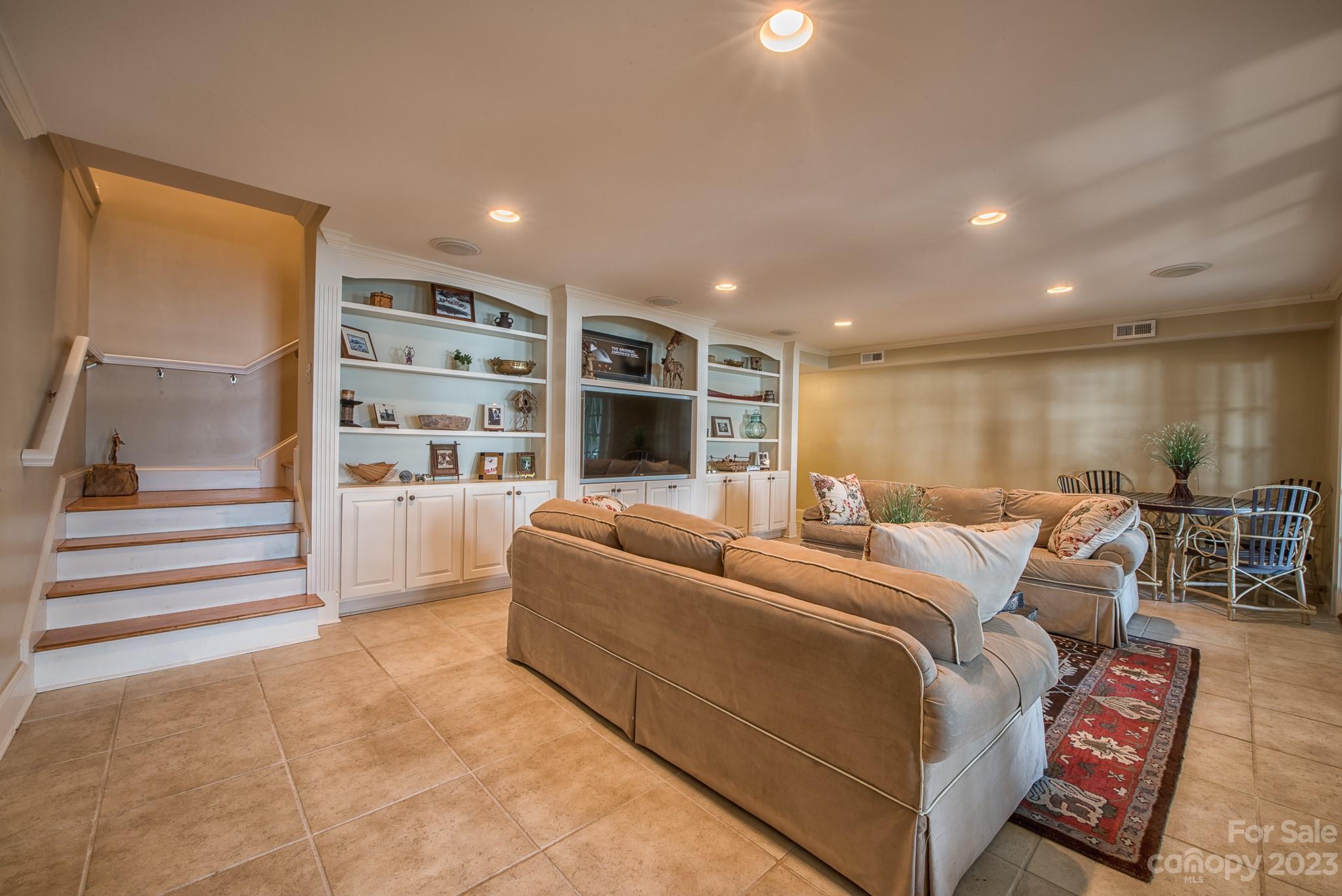 135 Winston Way Troutman, NC 28166 - Photo 43 of 48 a living room with furniture and a large window