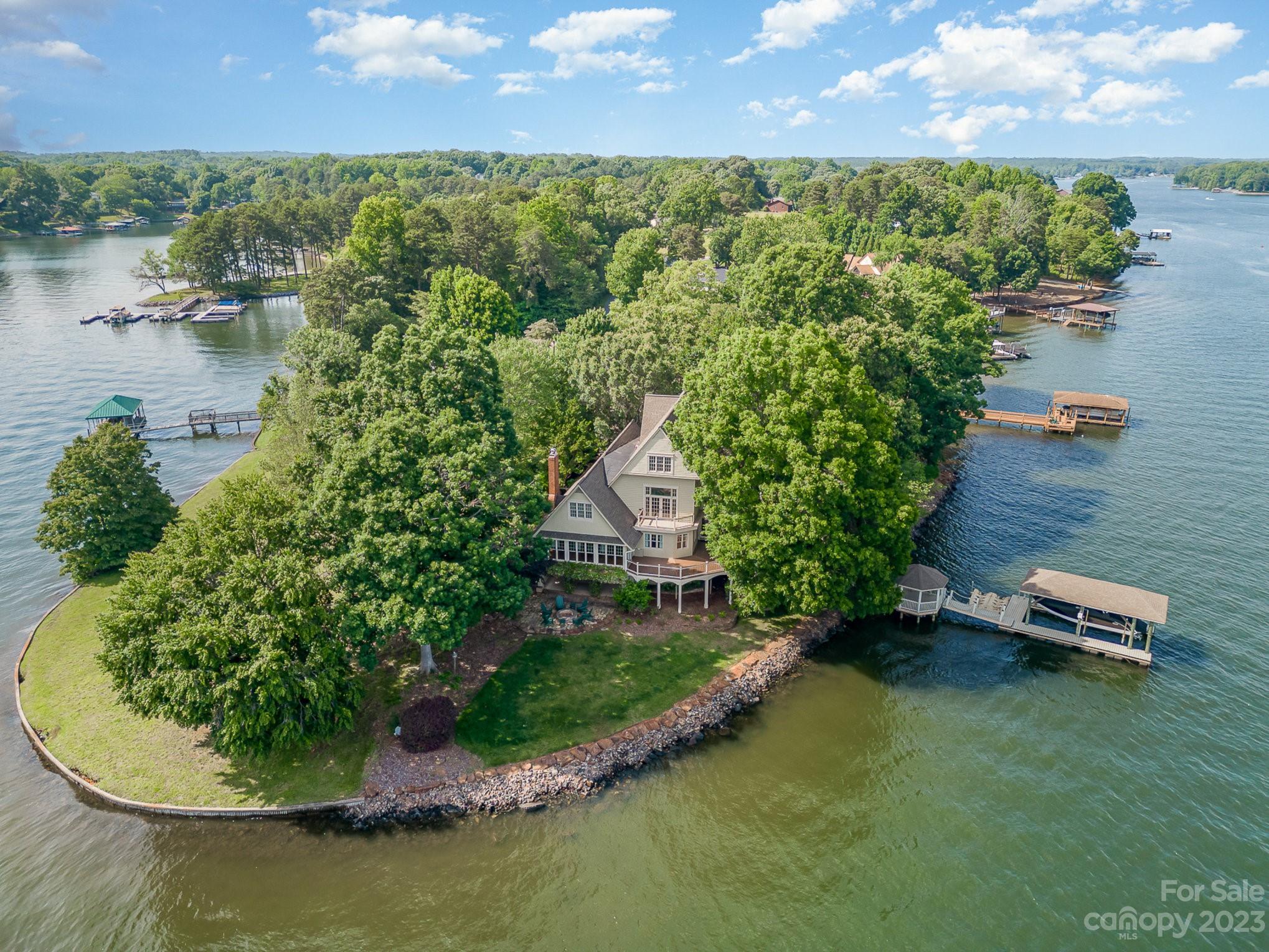 135 Winston Way Troutman, NC 28166 - Photo 47 of 48 an aerial view of a house with a yard and lake view