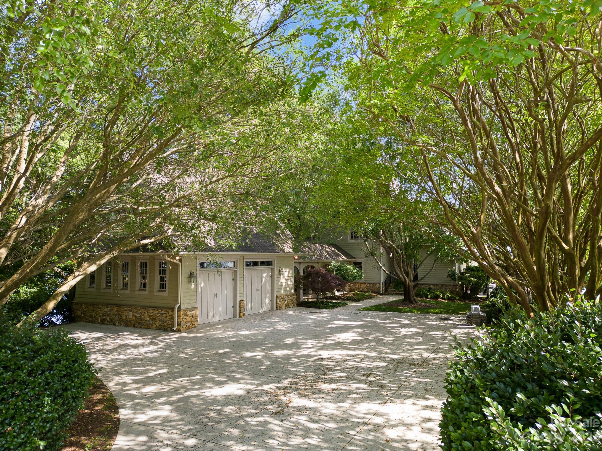 135 Winston Way Troutman, NC 28166 - Photo 7 of 48 a view of a house with a tree