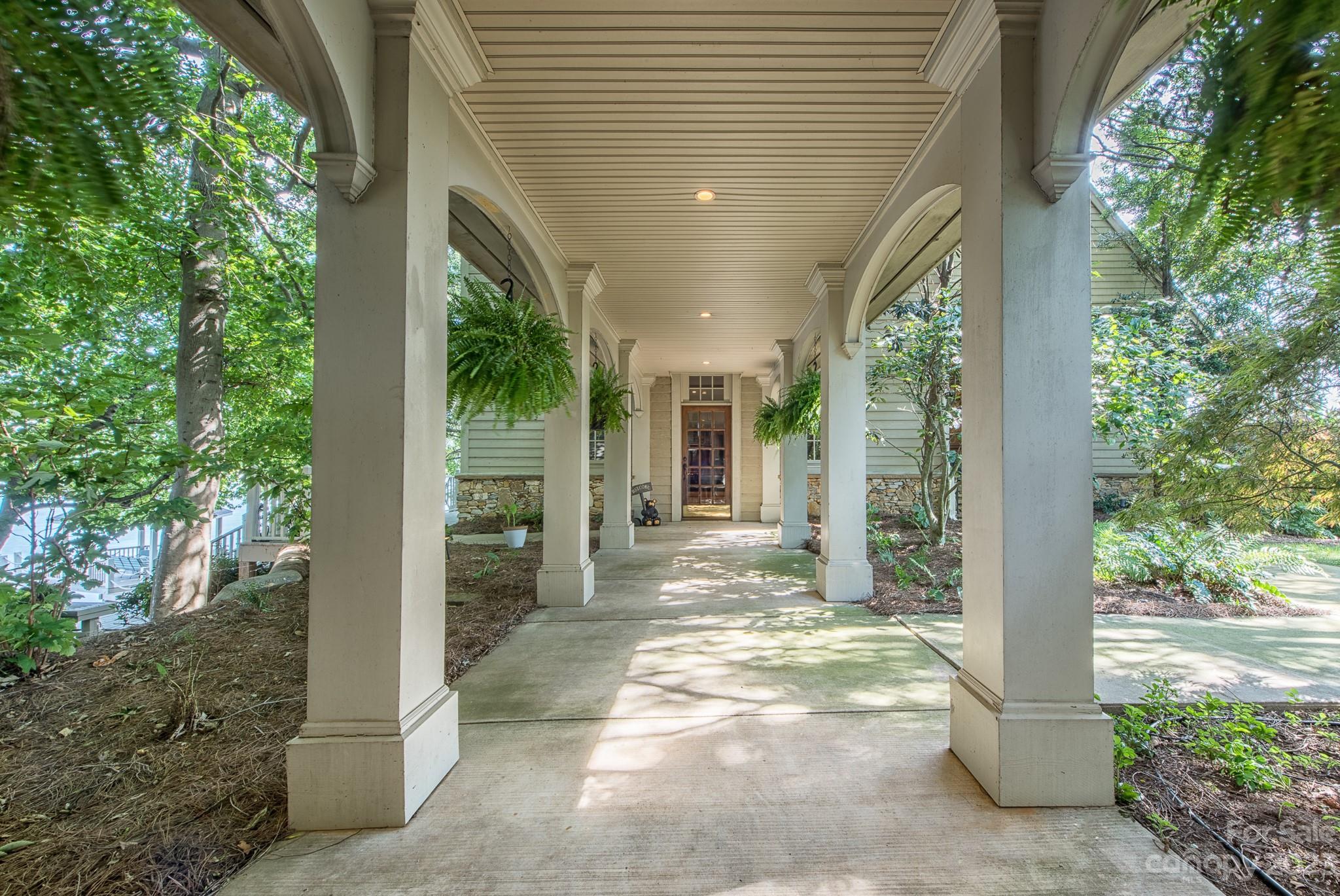 135 Winston Way Troutman, NC 28166 - Photo 9 of 48 a view of a porch with backyard of the house