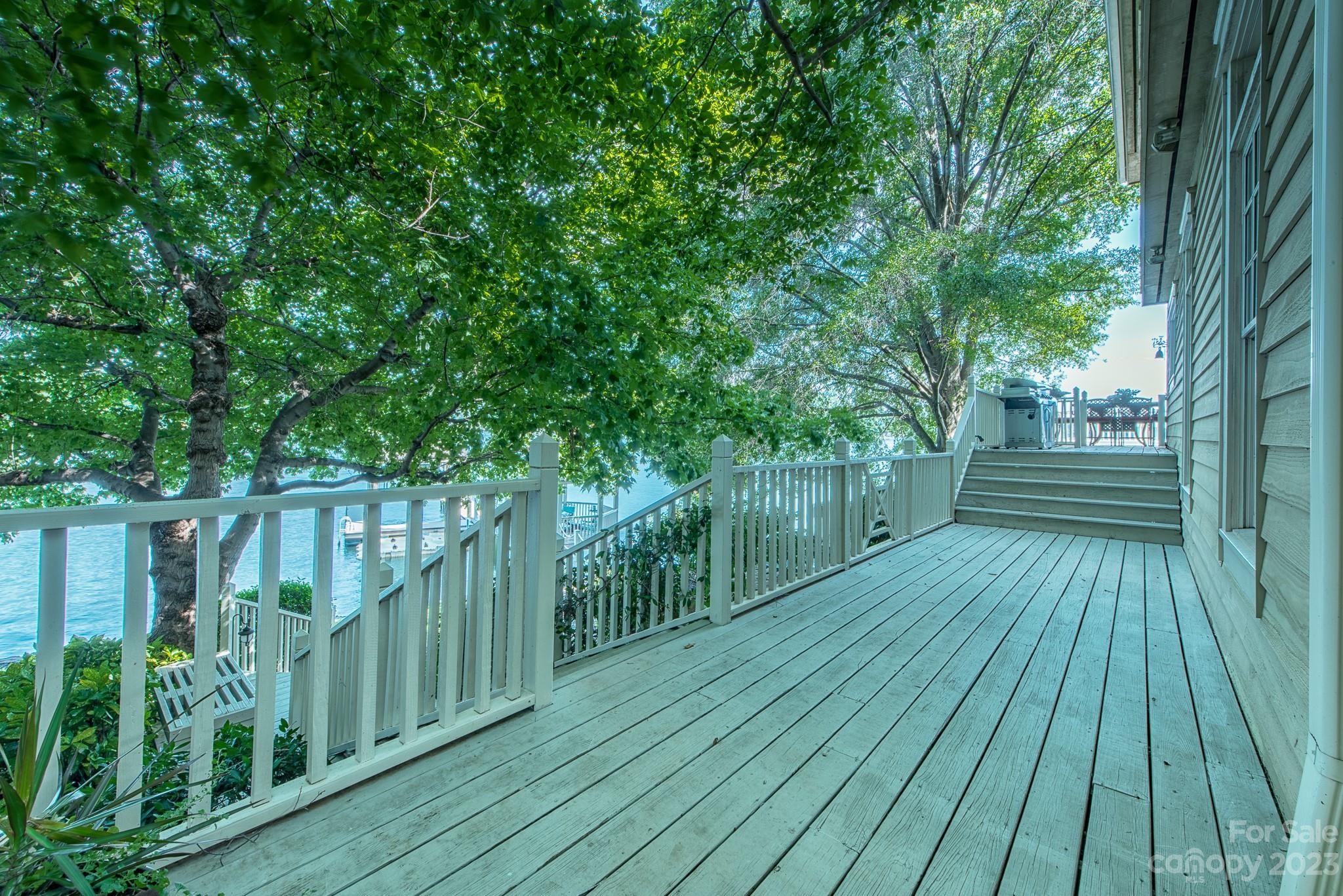 135 Winston Way Troutman, NC 28166 - Photo 10 of 48 a view of deck with wooden floor and fence
