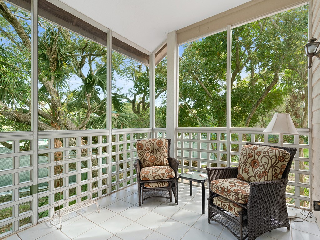a outdoor living space with furniture and garden view