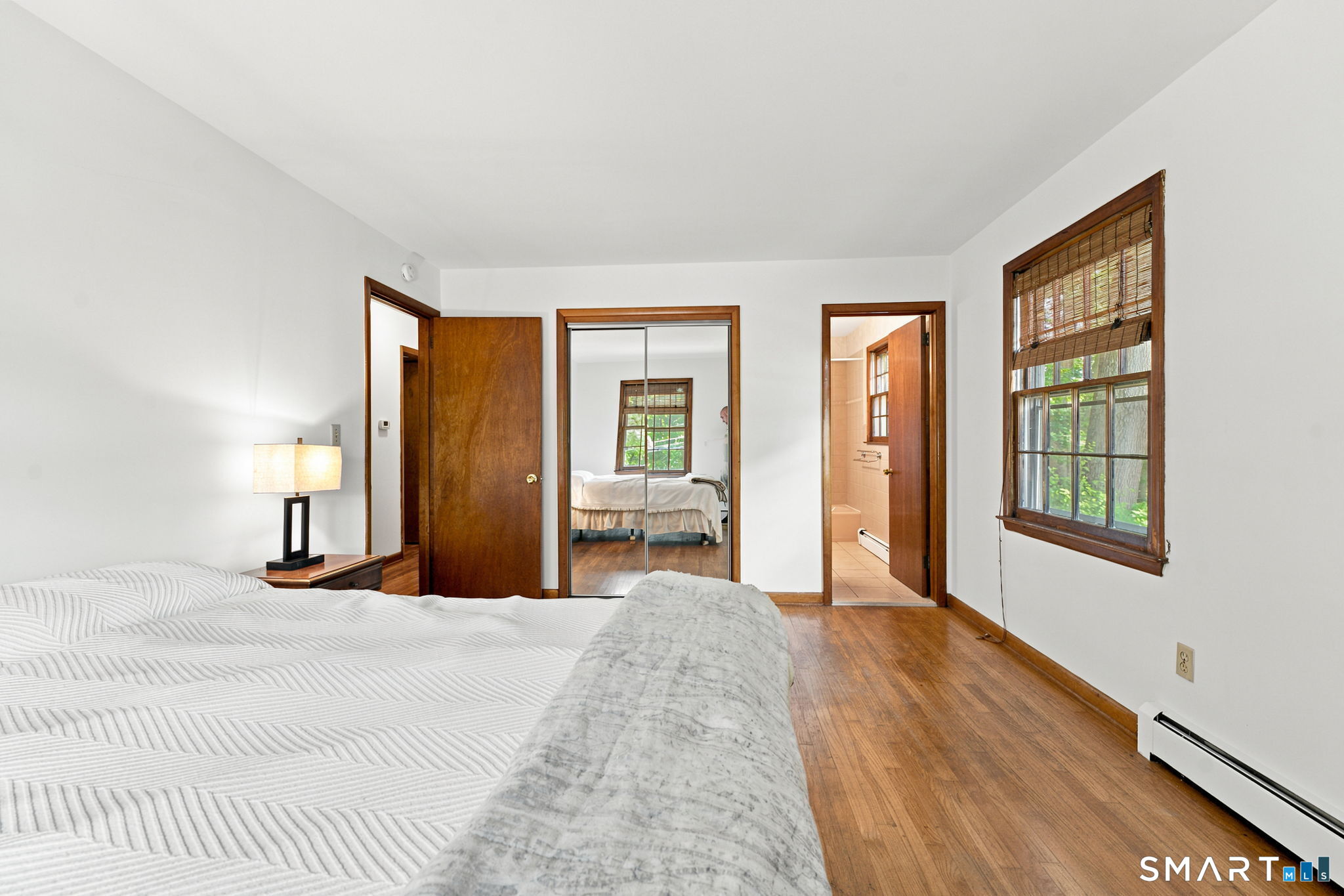 448 Mixville Road Cheshire, CT 06410 - Photo 15 of 32 a bedroom with a bed and a large window