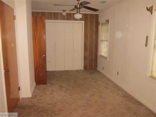 222 Wheeler Road Reidsville, NC 27320 - Photo 7 of 8 Master Bedroom. LARGER BEDROOM USE TO BE TWO SMALL BEDROOMS