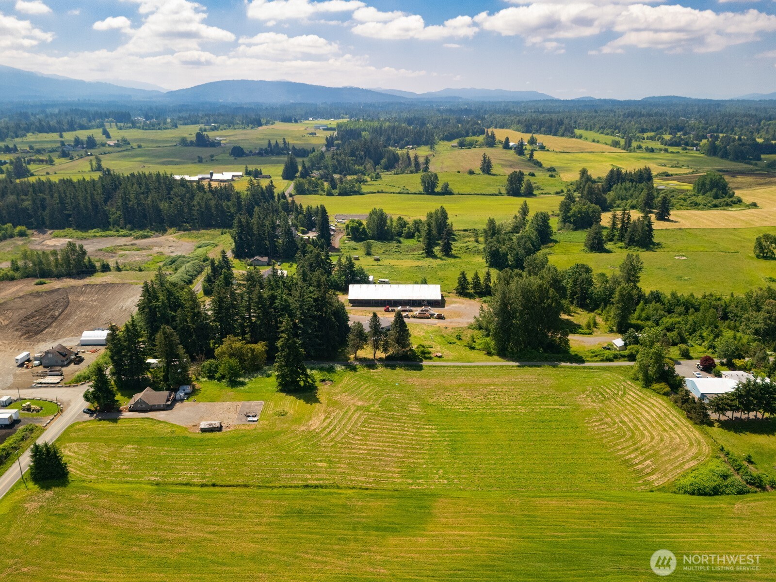 6791 Noon Road Everson, WA 98247 - Photo 30 of 38 a view of a swimming pool with an outdoor seating and yard