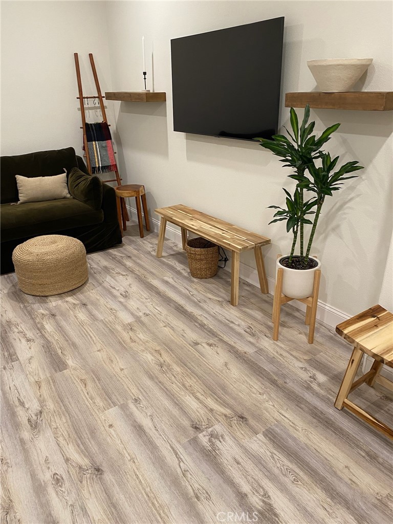 12228 Veranda Drive Rancho Cucamonga, CA 91739 - Photo 12 of 23 a living room with furniture and a flat screen tv