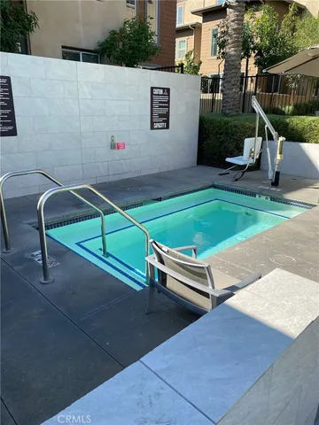 a view of backyard with outdoor seating