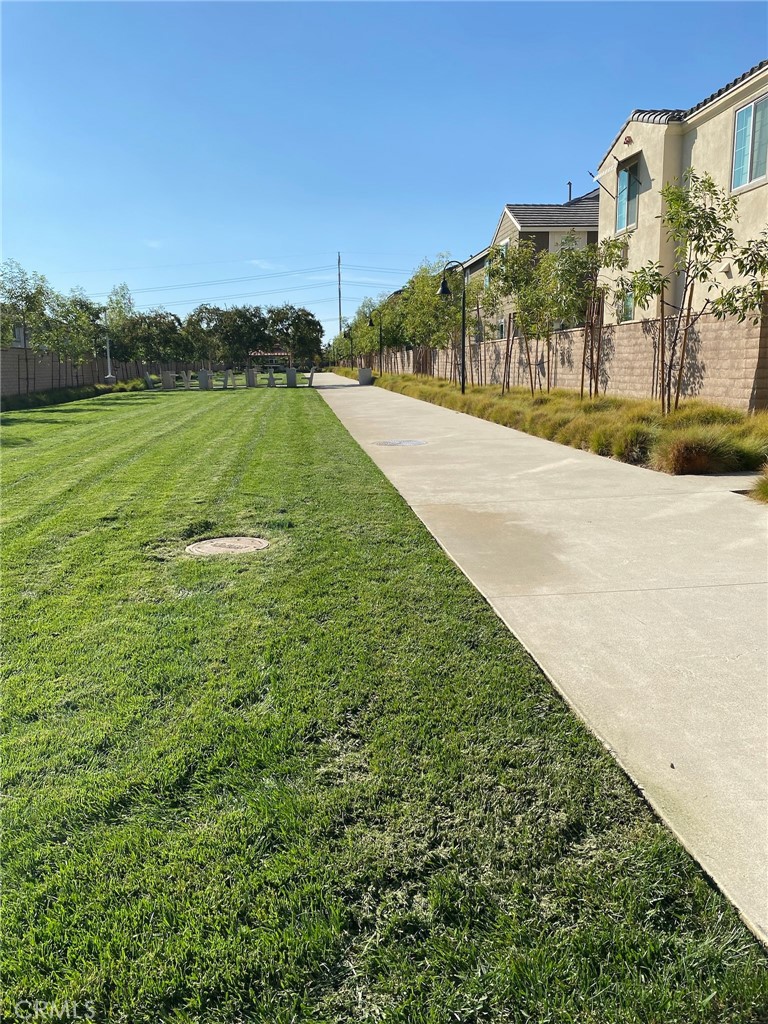 12228 Veranda Drive Rancho Cucamonga, CA 91739 - Photo 22 of 23 a view of a lake with a big yard
