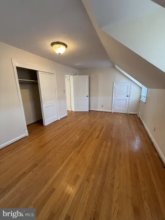 a view of a livingroom with wooden floor