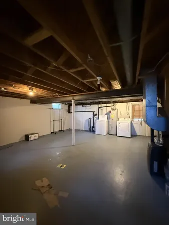 a view of empty room with windows