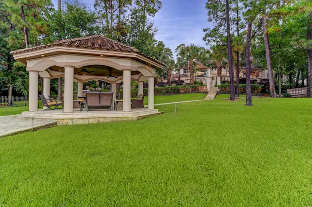 a view of front of house with a yard