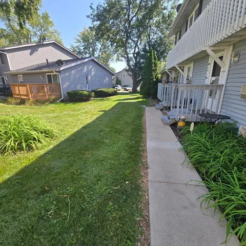 a view of a house with garden