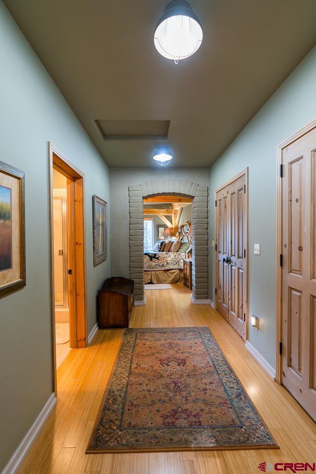 200 Longview Lane Bayfield, CO 81122 - Photo 11 of 33 a room with a couch and a chandelier