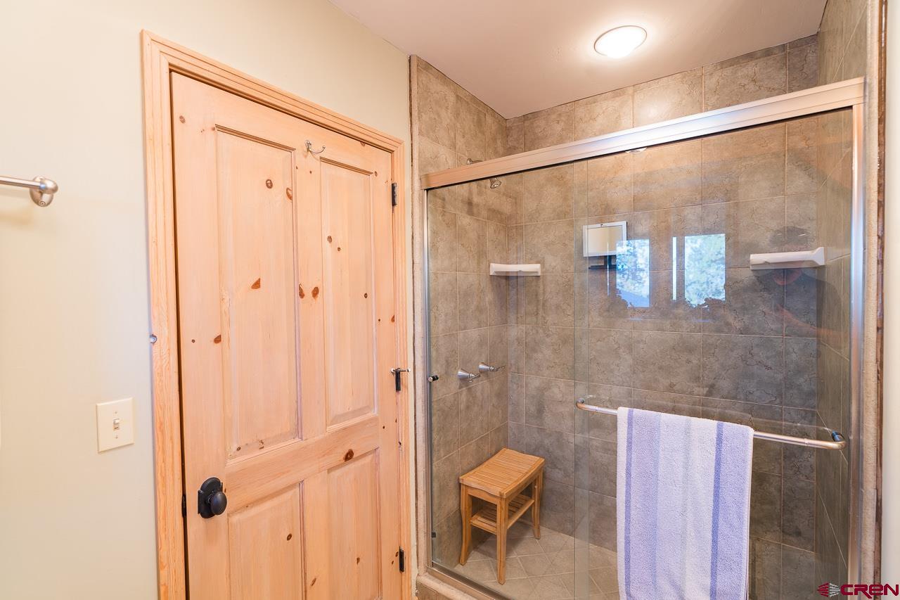 200 Longview Lane Bayfield, CO 81122 - Photo 17 of 33 a bathroom with a shower and a toilet