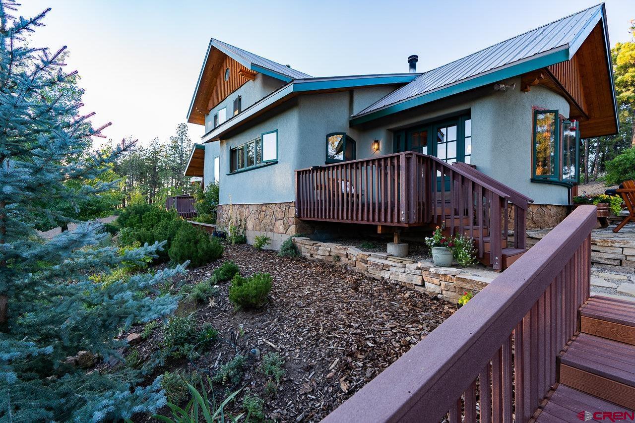 200 Longview Lane Bayfield, CO 81122 - Photo 24 of 33 a front view of a house with garden