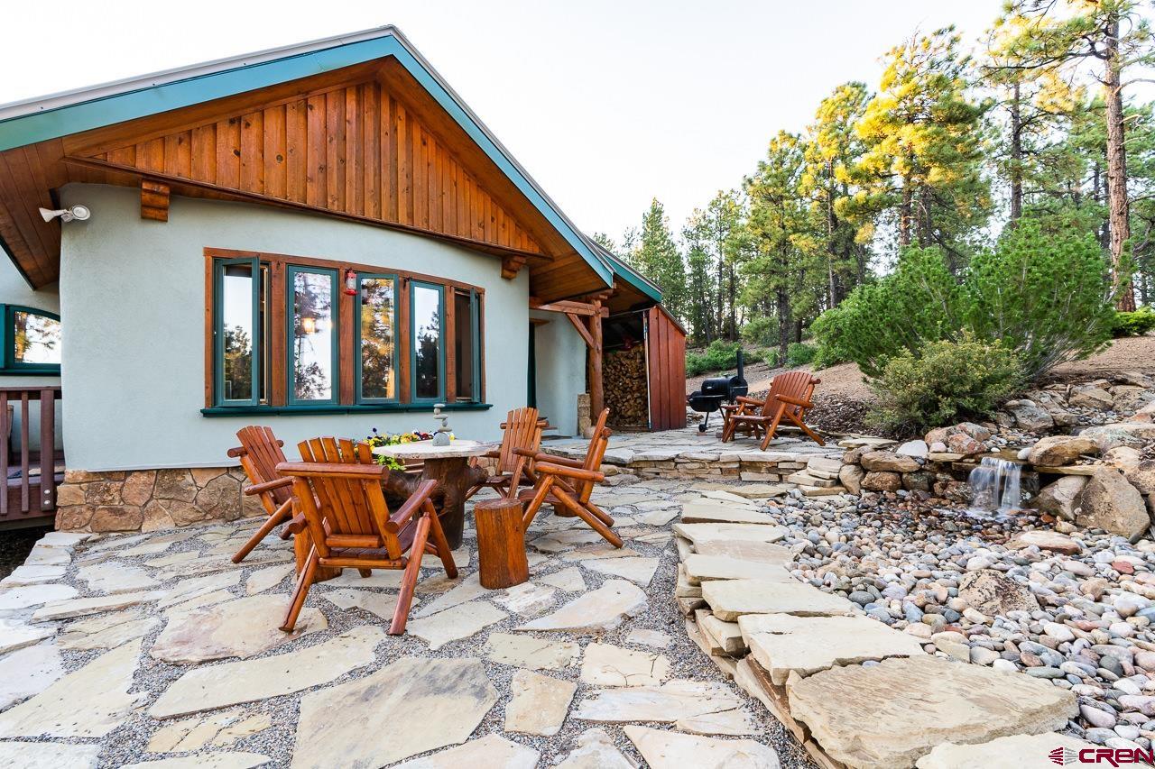200 Longview Lane Bayfield, CO 81122 - Photo 25 of 33 a backyard of a house with outdoor seating