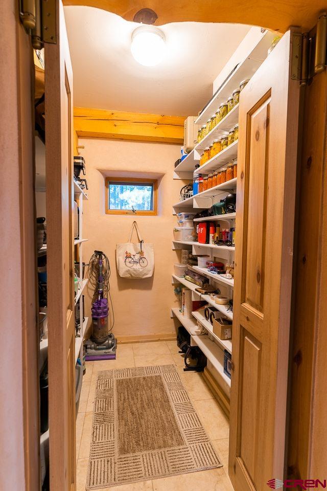 200 Longview Lane Bayfield, CO 81122 - Photo 5 of 33 a view of walk in closet with clothes and shoes