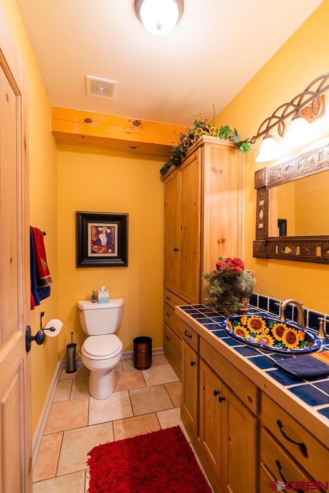 200 Longview Lane Bayfield, CO 81122 - Photo 9 of 33 a bathroom with a sink toilet and shower