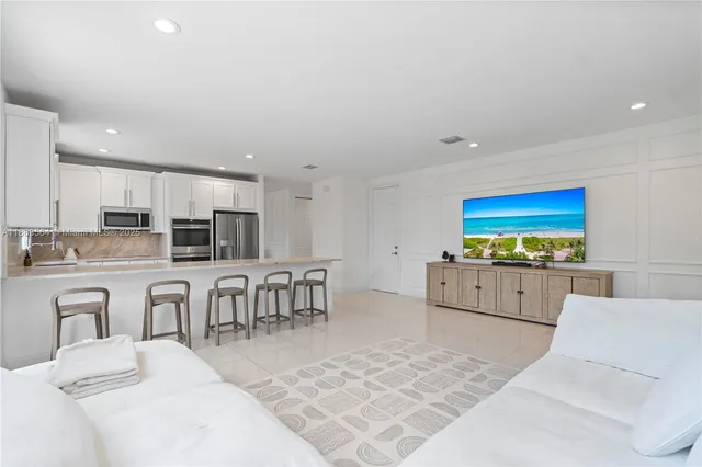 a bathroom with a sink double vanity and a mirror