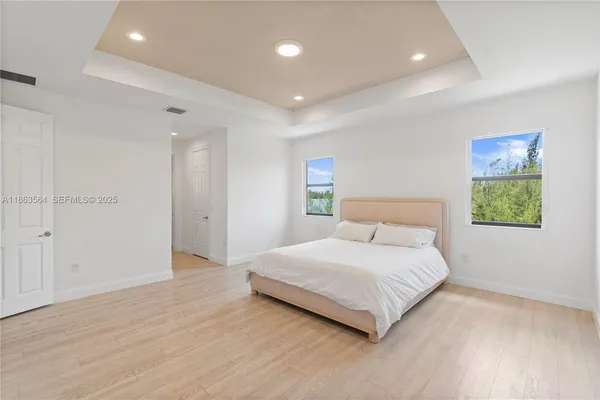 a view of a bathroom from a hallway