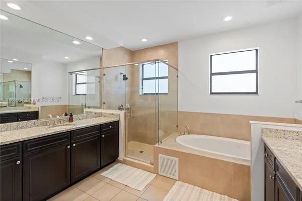 a view of a bathroom from the hallway