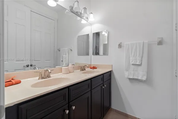 a room with a bed furniture and a window