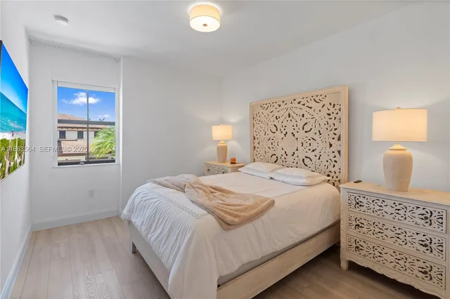 a view of a palm trees in front of a house