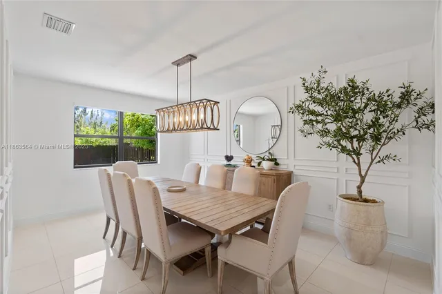 a kitchen with stainless steel appliances a sink and a stove top oven