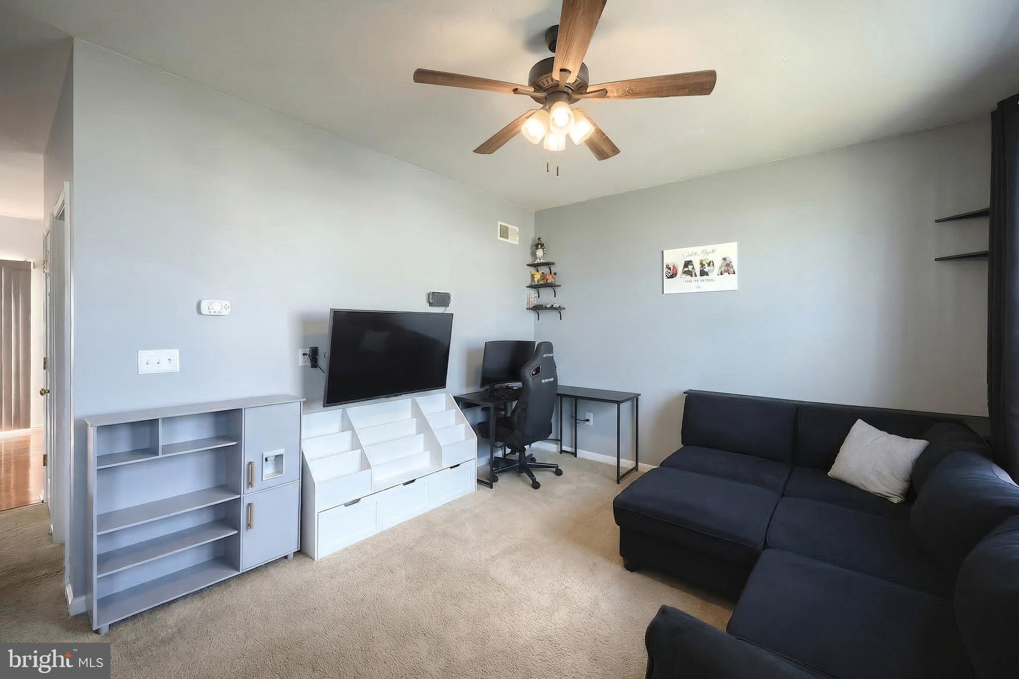 322 Cape Climb York, PA 17408 - Photo 17 of 31 a living room with furniture and a couch