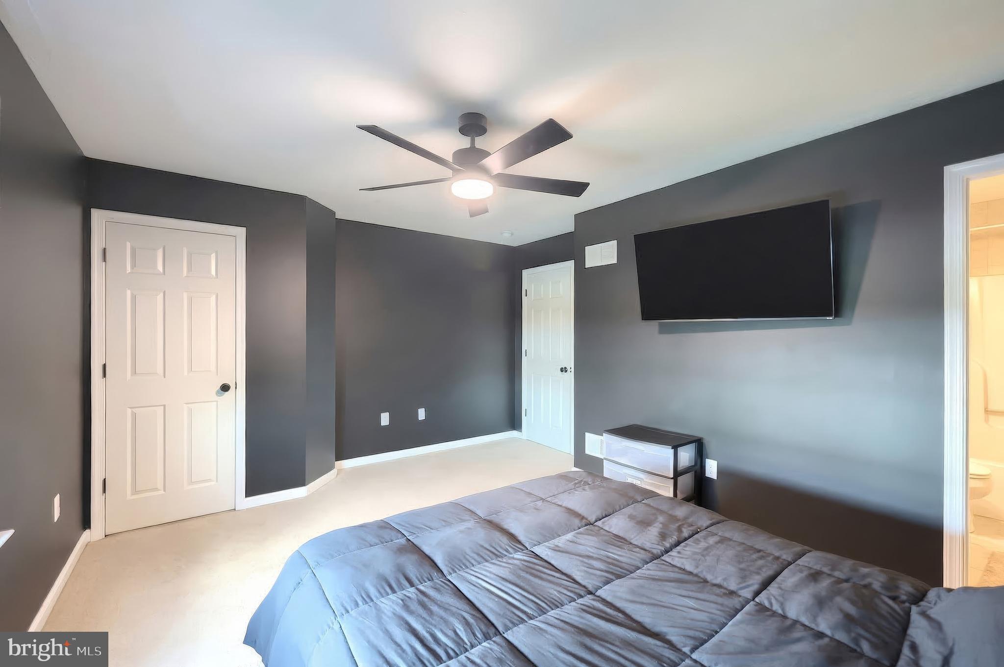322 Cape Climb York, PA 17408 - Photo 29 of 31 a bedroom with a bed and a flat screen tv
