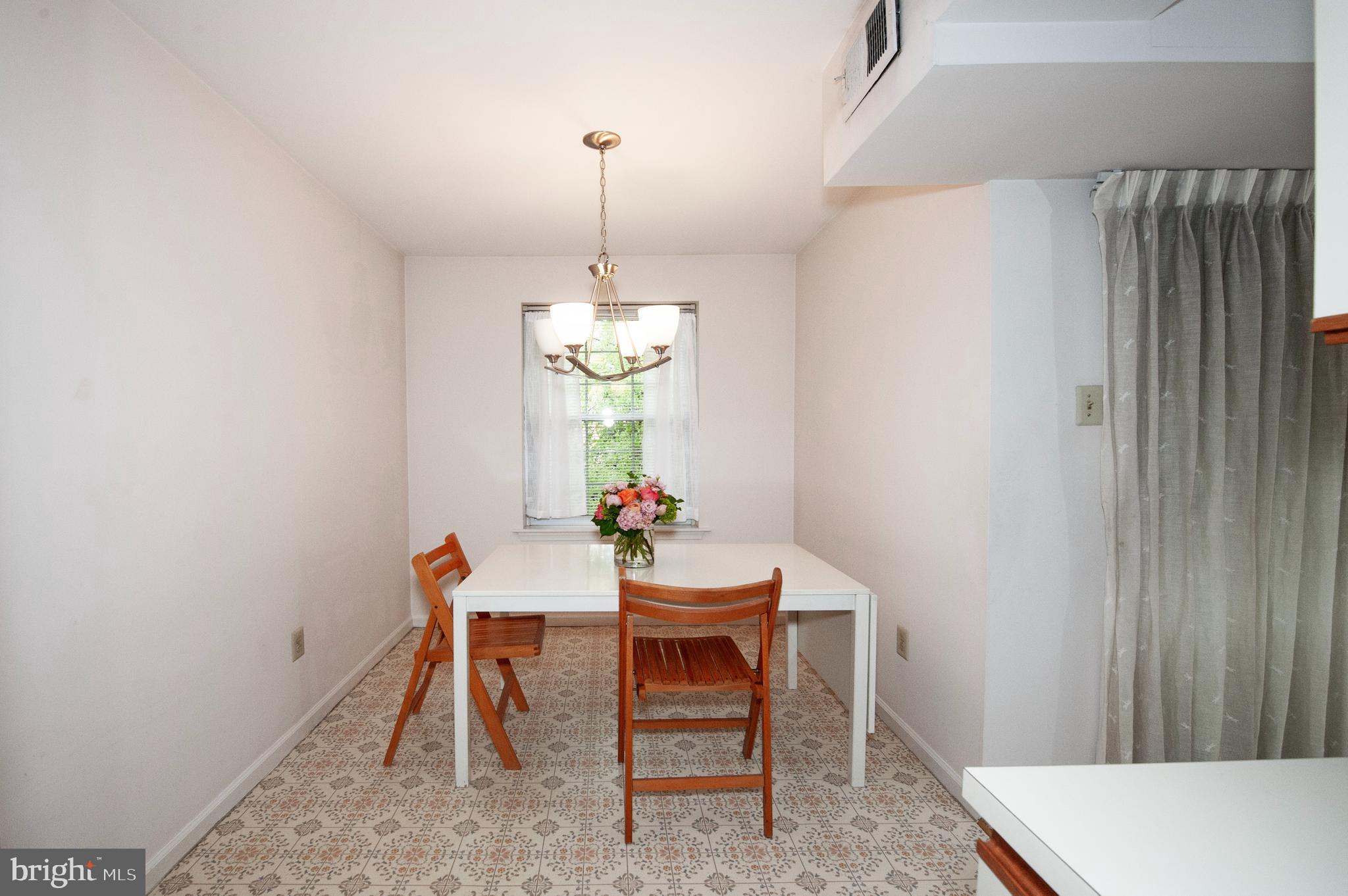 631 Washington Place Chesterbrook, PA 19087 - Photo 12 of 21 a dining room with furniture and window