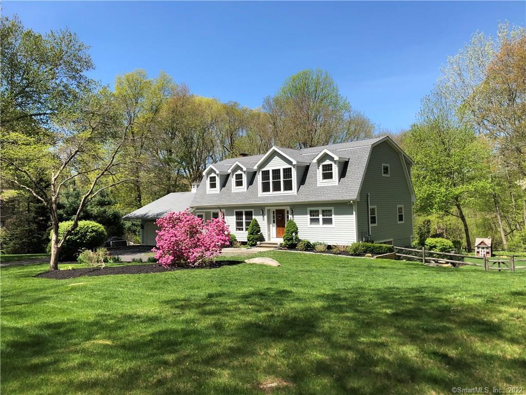 141 Wildcat Road Madison, CT 06443 - Photo 1 of 1 a front view of multi story residential apartment building with yard and green space